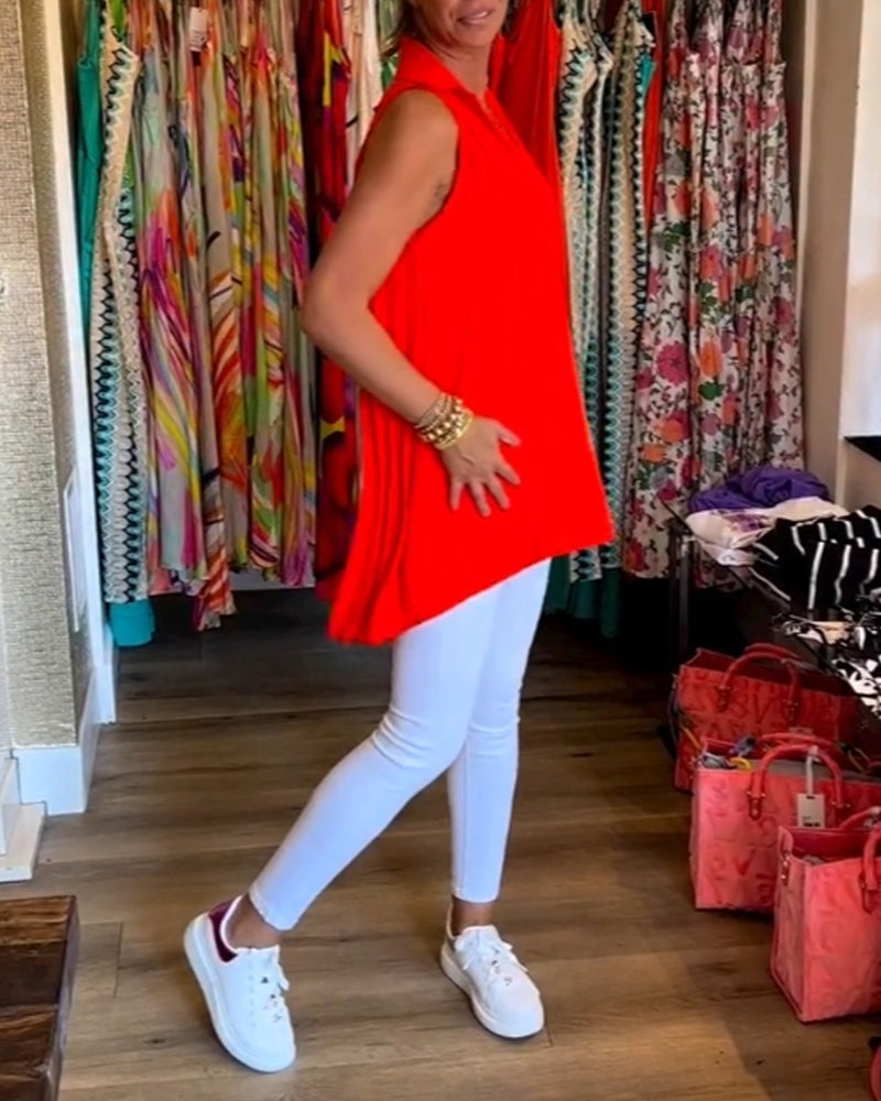 Ermeløs topp med volanger og revers