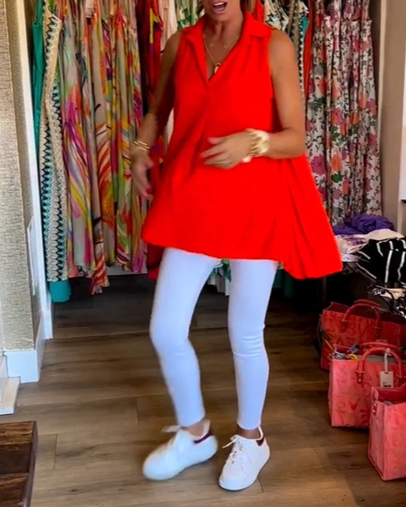 Ermeløs topp med volanger og revers