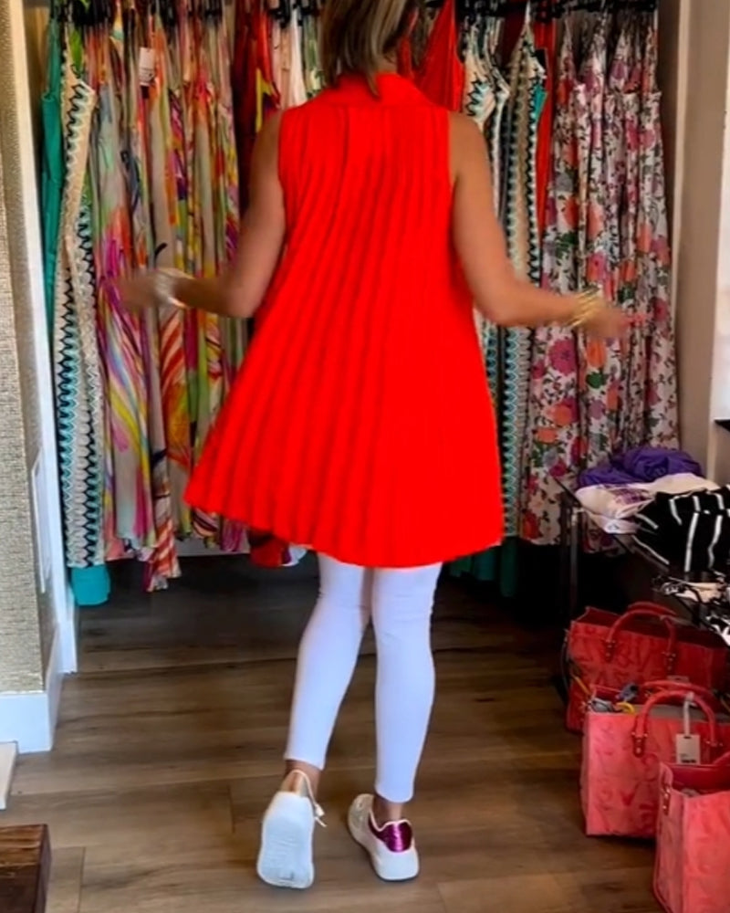 Ermeløs topp med volanger og revers