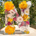 Nattlys med tørkede blomsterbokstaver