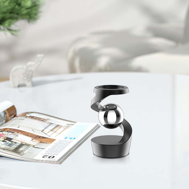 Roterende skrivebordsgyroskop