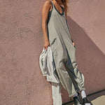 Ensfarget Jumpsuit med V-hals Sling Pocket