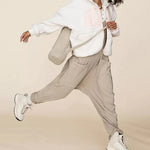 Ensfarget Jumpsuit med V-hals Sling Pocket