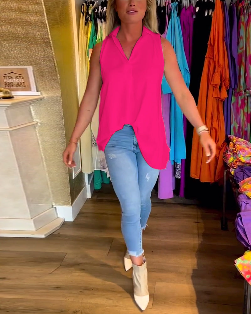 Ermeløs topp med volanger og revers