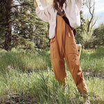 Ensfarget Jumpsuit med V-hals Sling Pocket