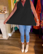 Ermeløs topp med volanger og revers