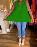 Ermeløs topp med volanger og revers