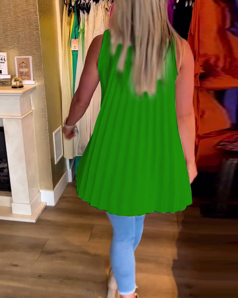 Ermeløs topp med volanger og revers