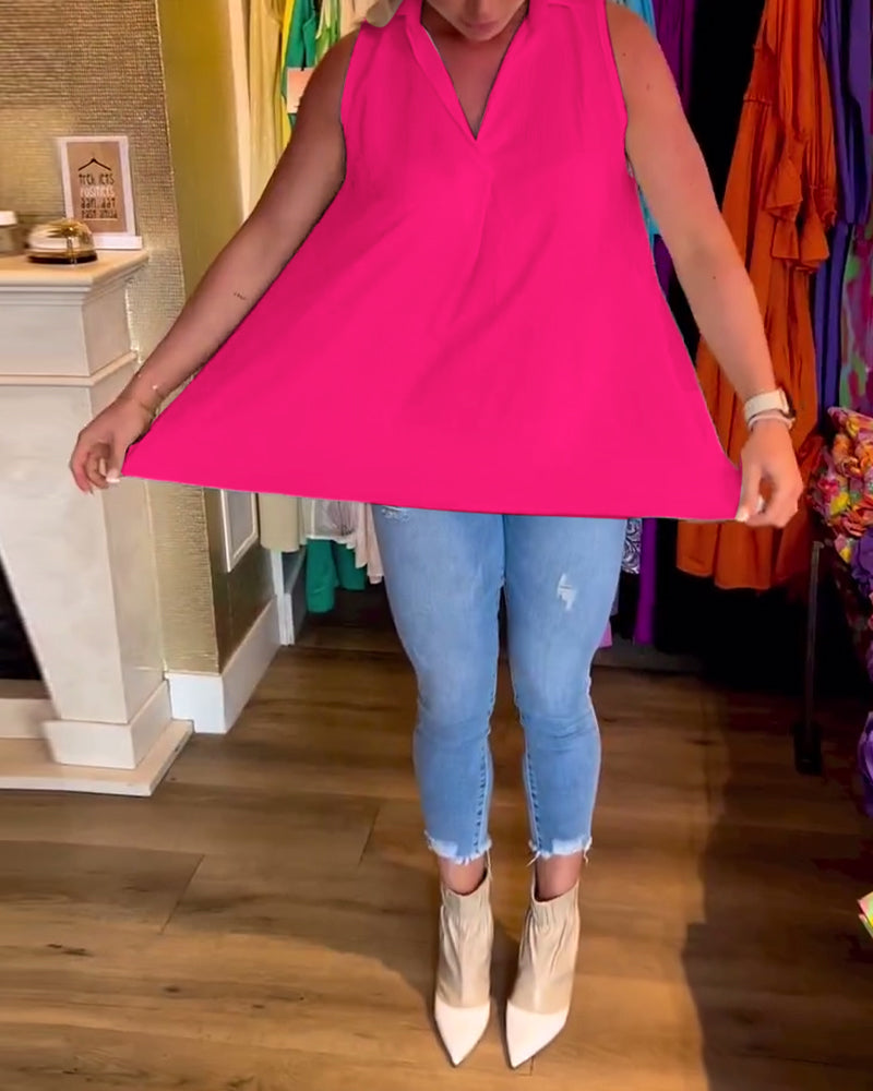 Ermeløs topp med volanger og revers