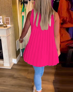 Ermeløs topp med volanger og revers