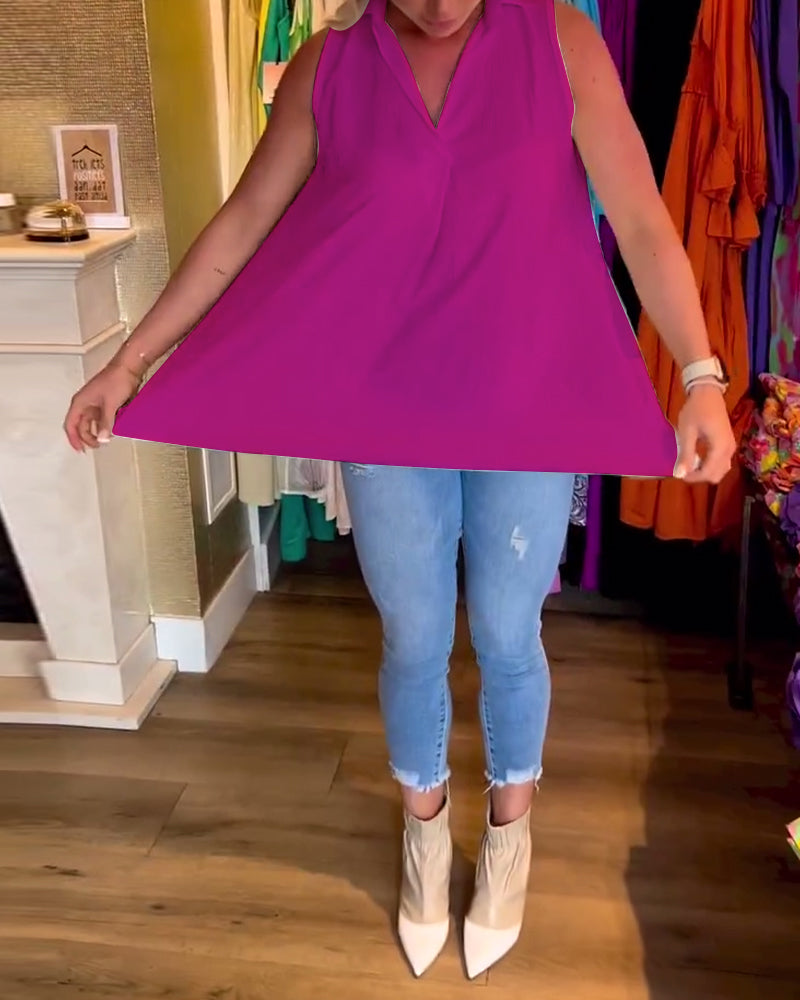 Ermeløs topp med volanger og revers