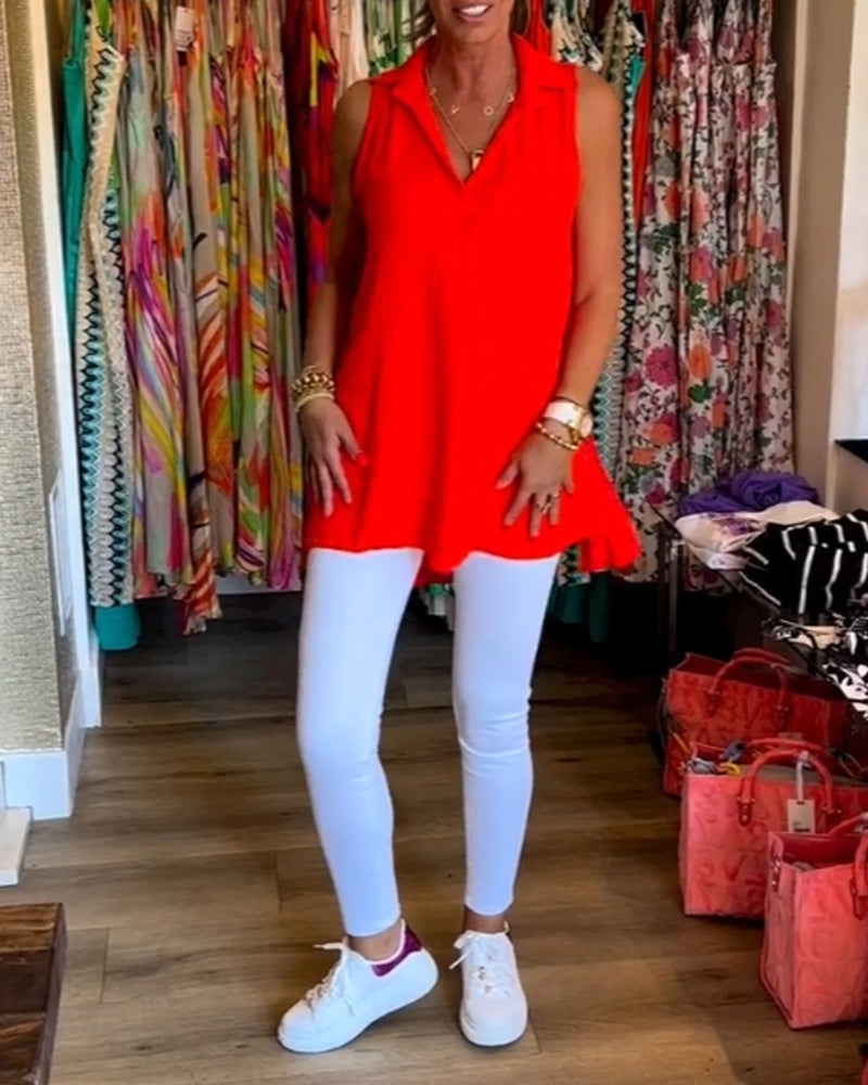 Ermeløs topp med volanger og revers