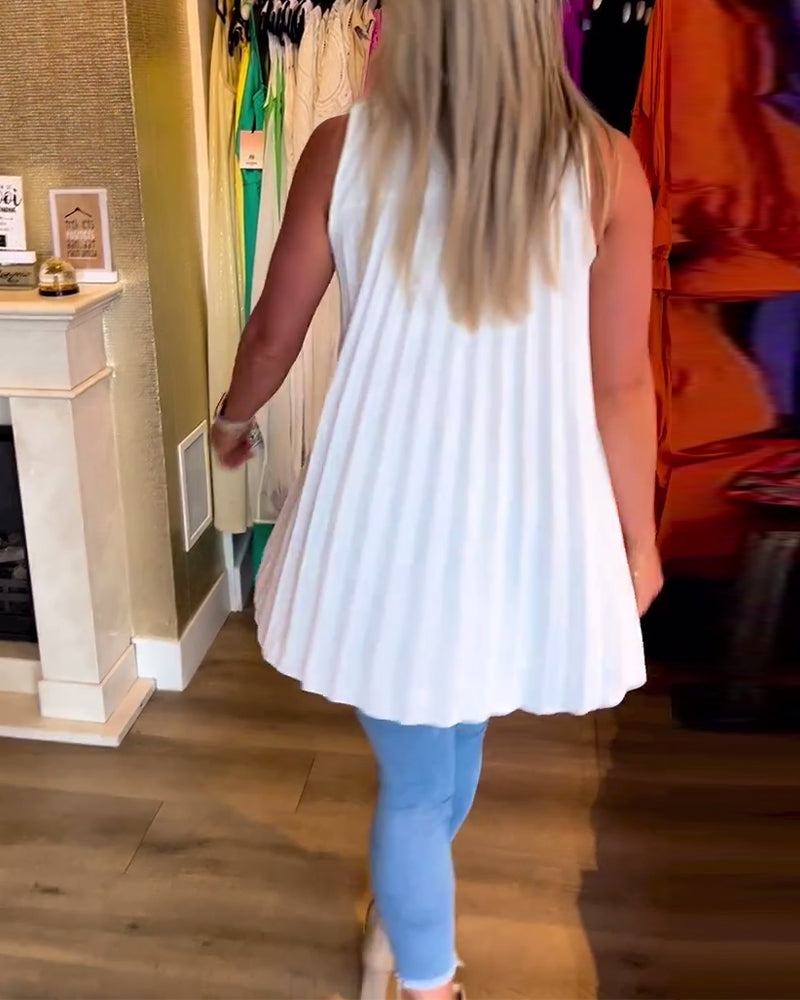 Ermeløs topp med volanger og revers