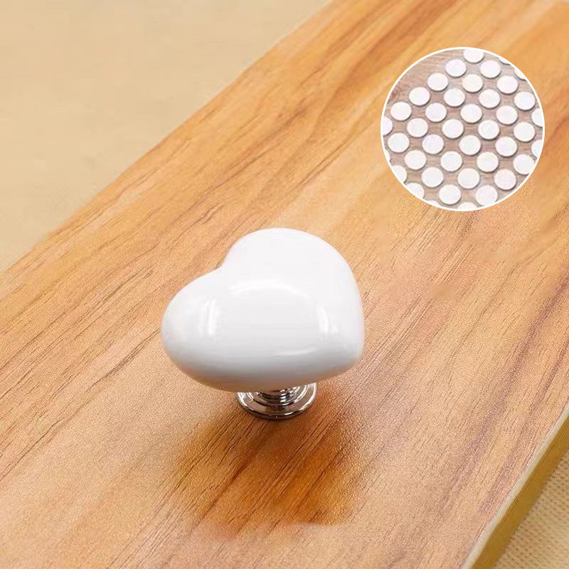 Hjerteformet toalettknapp