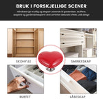 Hjerteformet toalettknapp