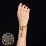 Armbånd som svelger beist i gull